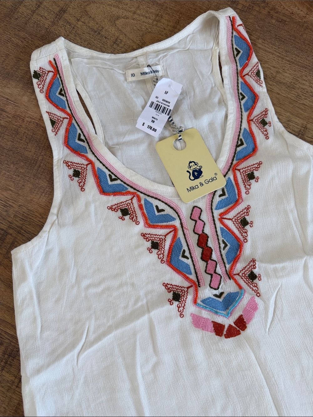 Cream Embroidered V-Neck sleeveless dress